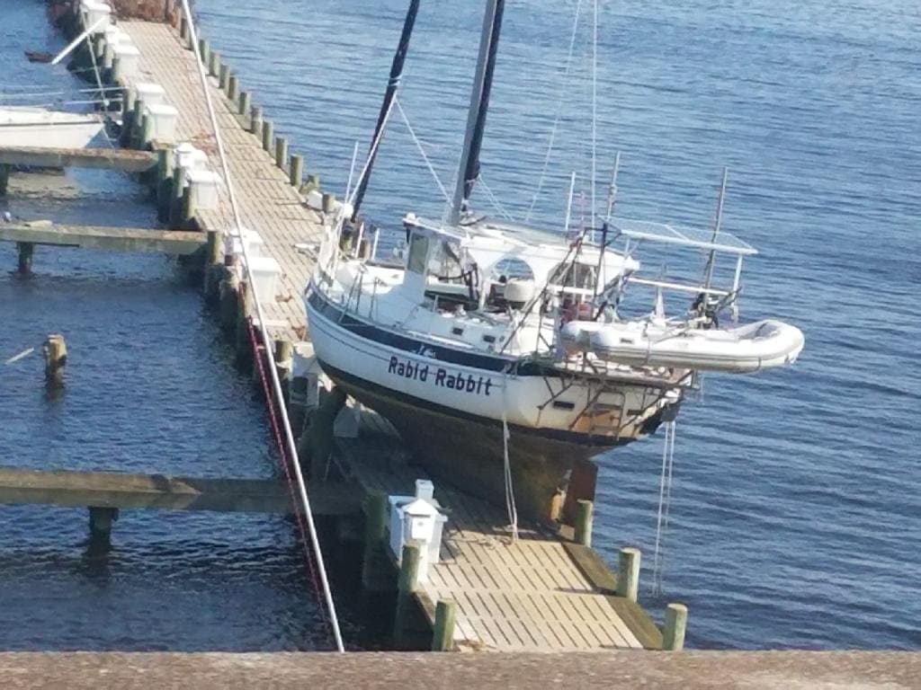 Which areas are at risk in north carolina from ocean rise 1 Sailboat marooned on top of dock in oriental after Hurricane Florence